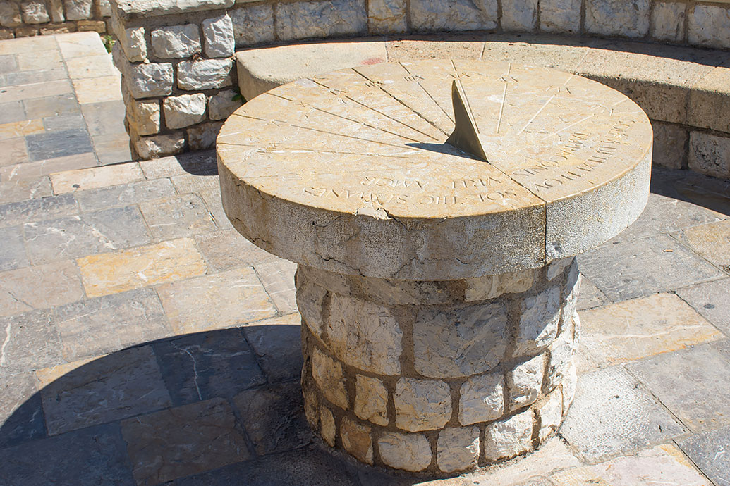 An antique stone sundial