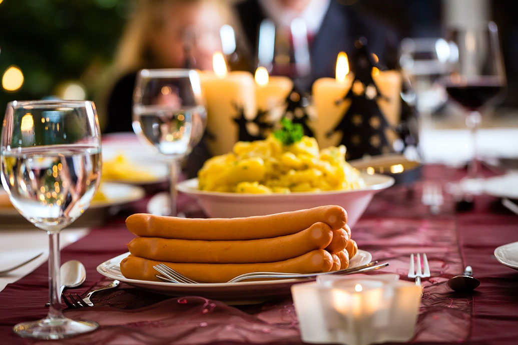 Traditional Christmas Eve meal – sausages with potato salad