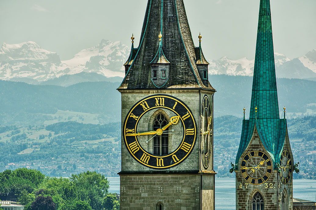 Two tower clocks in the city of Zurich in Switzerland