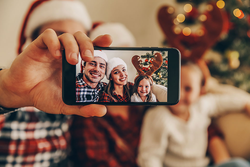 Family takes selfie with smartphone