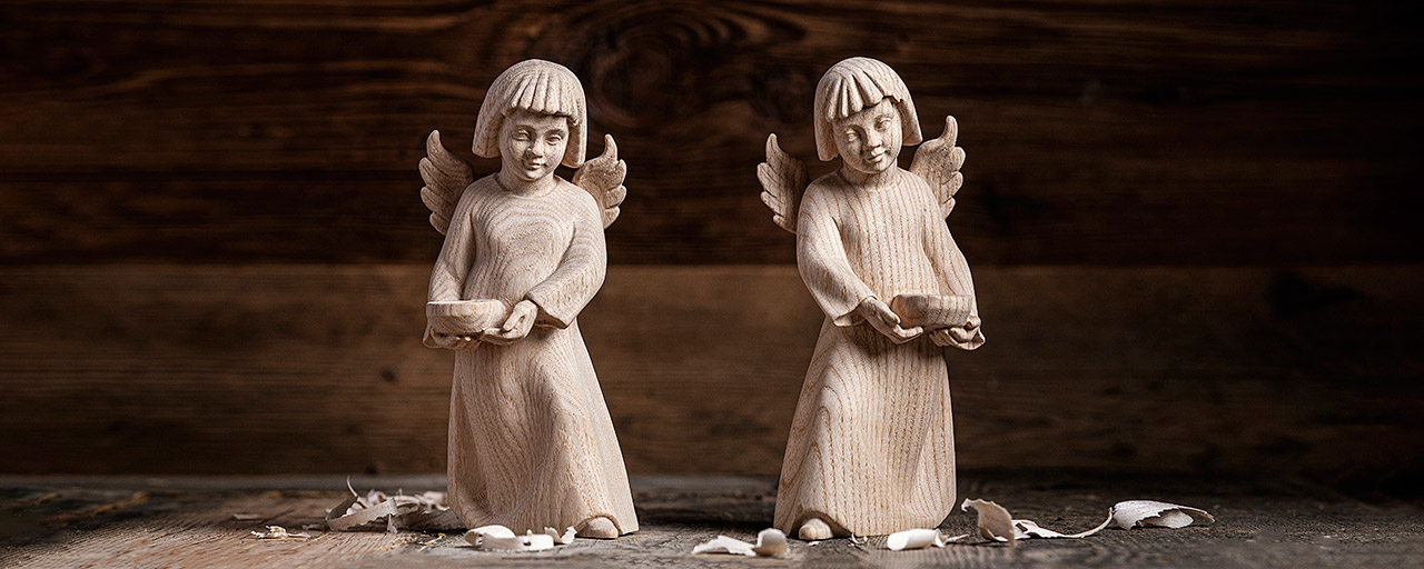 Wooden angel figures with instrument