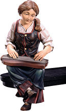 Zither player seated