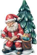 Weihnachtsmann mit Buch und Baum
