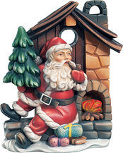 Weihnachtsmann mit Haus